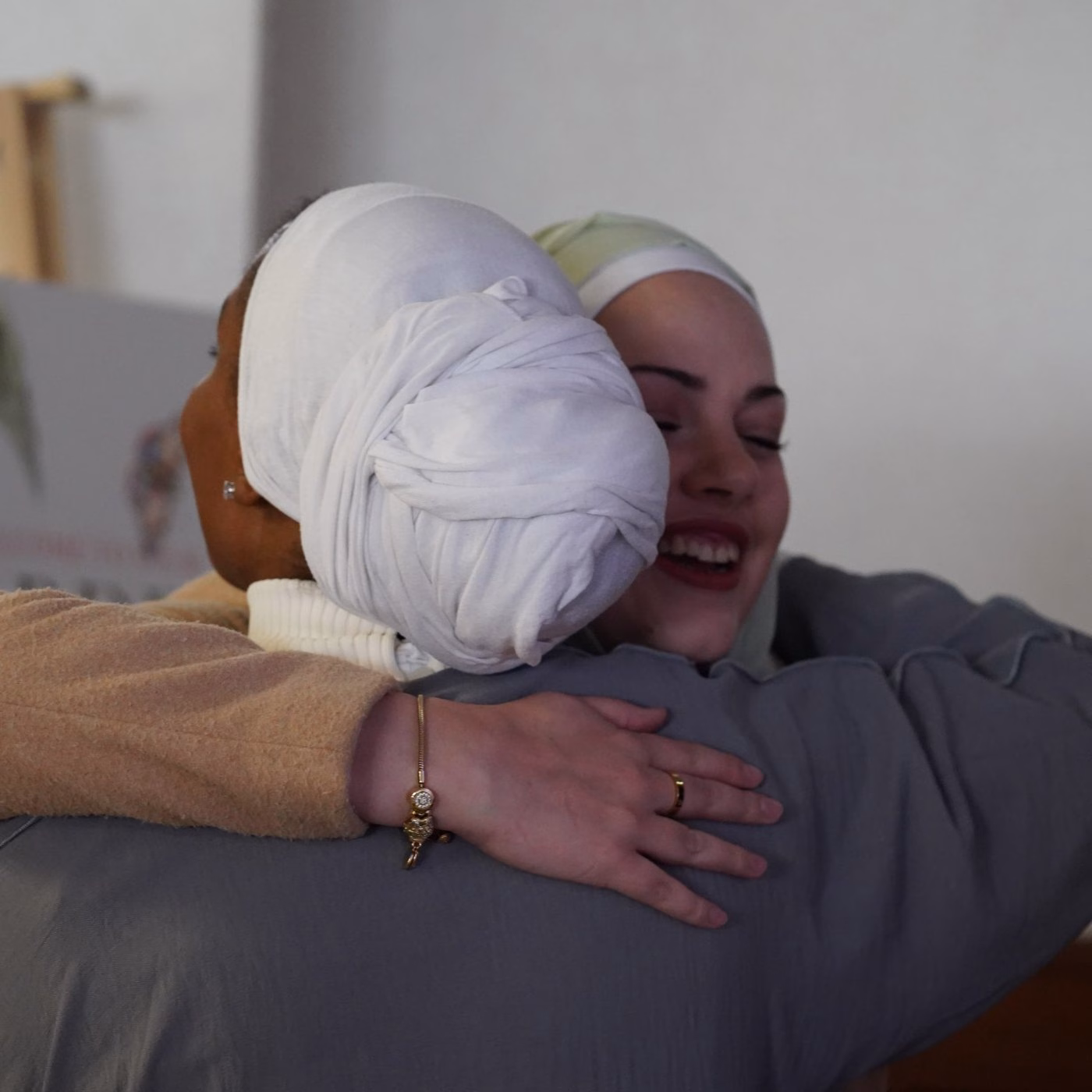 137A1161 Two women sharing a warm hug